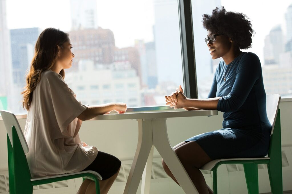 A client meeting and questioning an SEO agency in a consultation