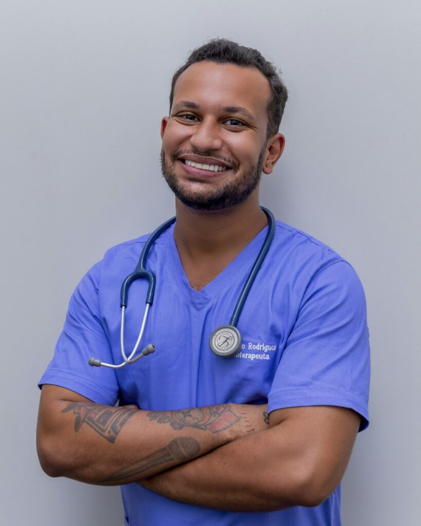A smiling healthcare professional in scrubs with a stethoscope, representing the expertise and trust (E-E-A-T) healthcare SEO must demonstrate
