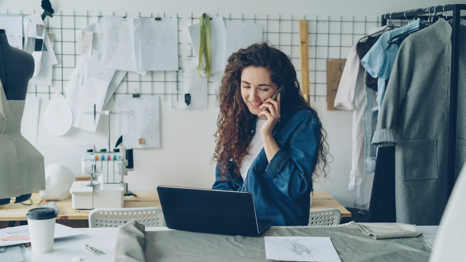 Local business owner working on a laptop, planning SEO for Manchester Google rankings